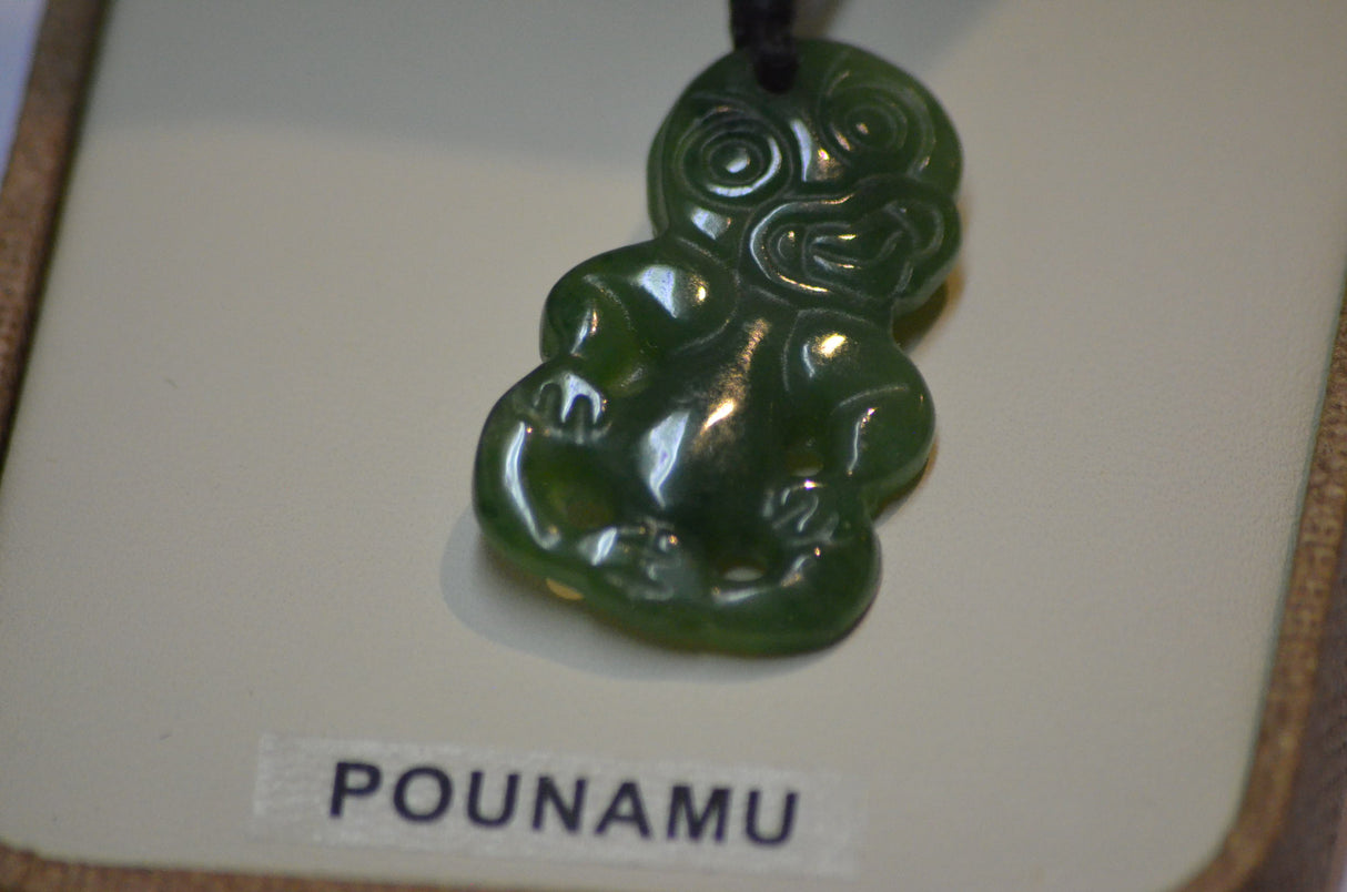 Genuine hand carved Hei Tiki Pounamu necklace